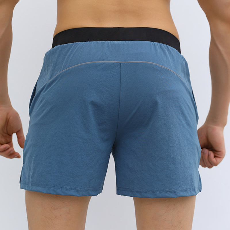 Pantalones cortos deportivos para hombres con cintura elástica con bolsillos (seda helada transpirable)